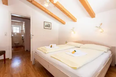 Ein Bett oder Betten in einem Zimmer der Unterkunft Chalet Habachtal - Wildkogel