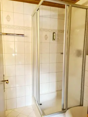 Ein Badezimmer in der Unterkunft Hotel Alpenhof***