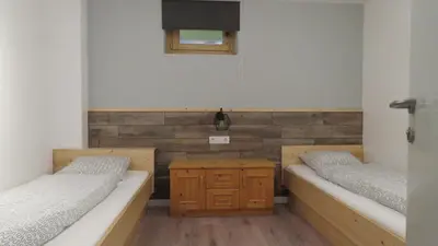Ein Bett oder Betten in einem Zimmer der Unterkunft Braunhof Apartments