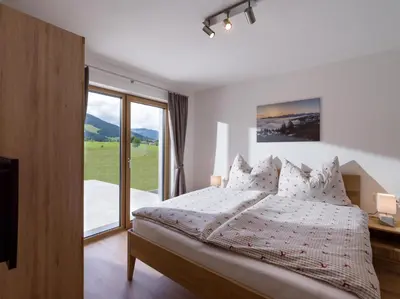 Ein Bett oder Betten in einem Zimmer der Unterkunft Reh4 Appartement