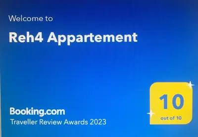 Ein Zertifikat, Auszeichnung, Logo oder anderes Dokument, das in der Unterkunft Reh4 Appartement ausgestellt ist