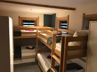 Ein Etagenbett oder Etagenbetten in einem Zimmer der Unterkunft The Farm