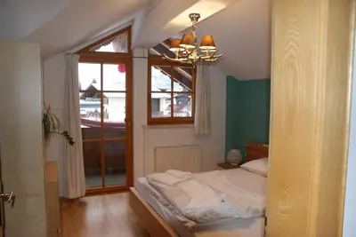 Ein Bett oder Betten in einem Zimmer der Unterkunft Absolute Active Roulette Apartments Kirchberg