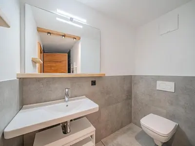 Ein Badezimmer in der Unterkunft Hohe Salve XL