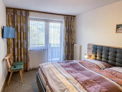 Ein Bett oder Betten in einem Zimmer der Unterkunft Apartment Ferwienwohnung Oberberghof by Interhome