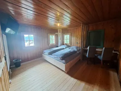 Ein Bett oder Betten in einem Zimmer der Unterkunft Ferienhof Holzmeister