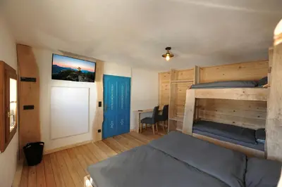 Ein Bett oder Betten in einem Zimmer der Unterkunft Ferienhof Holzmeister