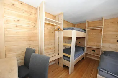 Ein Bett oder Betten in einem Zimmer der Unterkunft Ferienhof Holzmeister