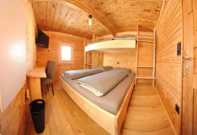 Ein Bett oder Betten in einem Zimmer der Unterkunft Ferienhof Holzmeister