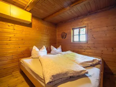 Ein Bett oder Betten in einem Zimmer der Unterkunft EAGGA-Niederleger Alm