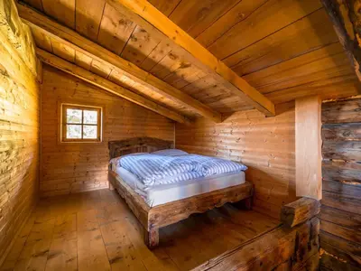 Ein Bett oder Betten in einem Zimmer der Unterkunft EAGGA-Niederleger Alm