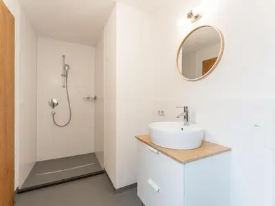 Ein Badezimmer in der Unterkunft Heimelig L