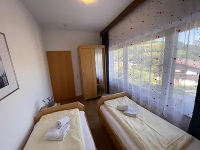 Ein Bett oder Betten in einem Zimmer der Unterkunft Sonnenalp Sonnhang de Luxe