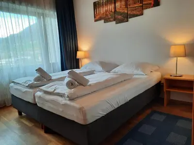 Ein Bett oder Betten in einem Zimmer der Unterkunft Sonnenalp Sonnhang de Luxe