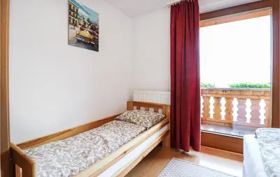 Ein Bett oder Betten in einem Zimmer der Unterkunft Moderne Ferienwohnung Uderns