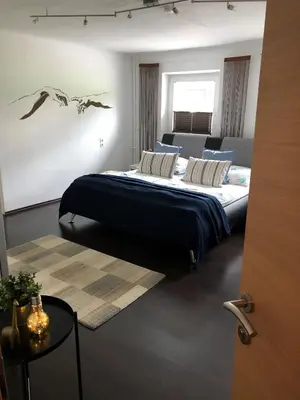 Ein Bett oder Betten in einem Zimmer der Unterkunft Landhaus Daum