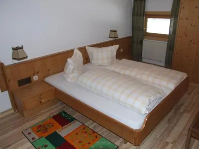 Ein Bett oder Betten in einem Zimmer der Unterkunft Gasthof Hauserwirt