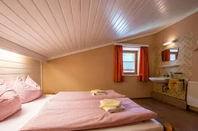 Ein Bett oder Betten in einem Zimmer der Unterkunft Apartment Zwölferblick