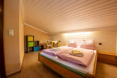 Ein Bett oder Betten in einem Zimmer der Unterkunft Apartment Zwölferblick
