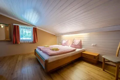Ein Bett oder Betten in einem Zimmer der Unterkunft Apartment Zwölferblick