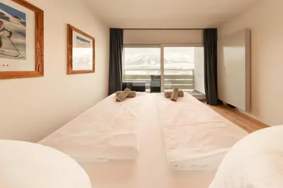 Ein Bett oder Betten in einem Zimmer der Unterkunft Apartment Alpenblick