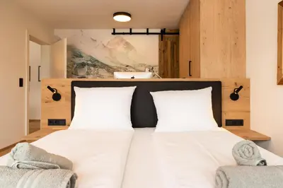 Ein Bett oder Betten in einem Zimmer der Unterkunft Apartment Alpenblick