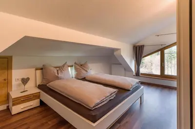 Ein Bett oder Betten in einem Zimmer der Unterkunft Appartement Waldmoos