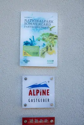 Ein Zertifikat, Auszeichnung, Logo oder anderes Dokument, das in der Unterkunft Appartment Lechner ausgestellt ist