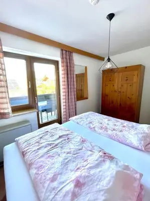 Ein Bett oder Betten in einem Zimmer der Unterkunft Haus Brandeck