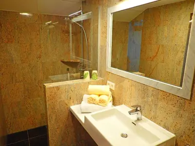 Ein Badezimmer in der Unterkunft Haus Alpenfriede