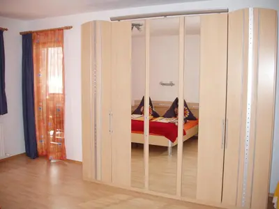 Ein Bett oder Betten in einem Zimmer der Unterkunft Ferienwohnung Wohlfartstätter