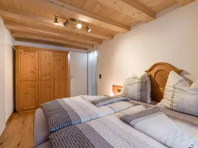 Ein Bett oder Betten in einem Zimmer der Unterkunft Trattenbachhof