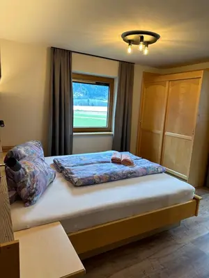 Ein Bett oder Betten in einem Zimmer der Unterkunft Apartment Bischofer