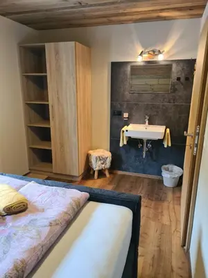 Ein Bett oder Betten in einem Zimmer der Unterkunft Apartment Bischofer