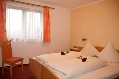 Ein Bett oder Betten in einem Zimmer der Unterkunft Ehstandhof