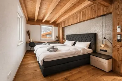 Ein Bett oder Betten in einem Zimmer der Unterkunft CLOUD 9 - by AlpenLuxus Collection