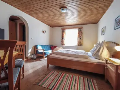 Ein Bett oder Betten in einem Zimmer der Unterkunft Ferienhof Haindlbauer