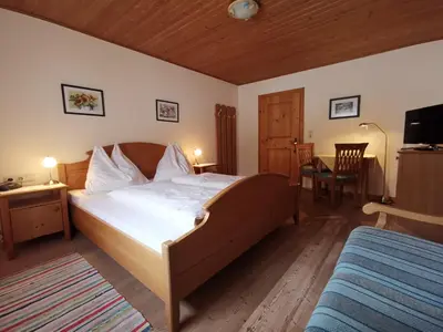 Ein Bett oder Betten in einem Zimmer der Unterkunft Ferienhof Haindlbauer
