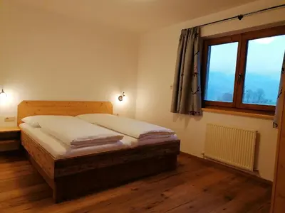Ein Bett oder Betten in einem Zimmer der Unterkunft Landhaus Brixental