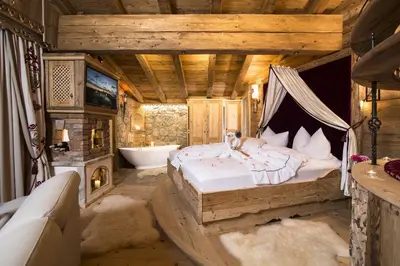Ein Bett oder Betten in einem Zimmer der Unterkunft Luxus Chalet Bischofer- Bergwelt