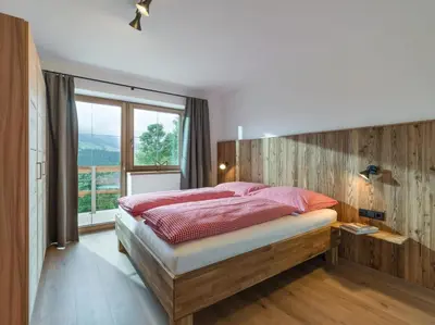 Ein Bett oder Betten in einem Zimmer der Unterkunft BERGappartement KINK