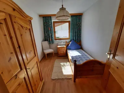 Ein Bett oder Betten in einem Zimmer der Unterkunft Ferienwohnung Erhart Scheffau