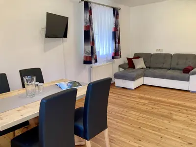 Ein Sitzbereich in der Unterkunft Appartement Melodie