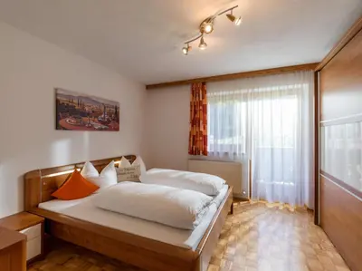 Ein Bett oder Betten in einem Zimmer der Unterkunft Appartement Melodie