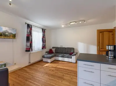 Ein Sitzbereich in der Unterkunft Appartement Melodie