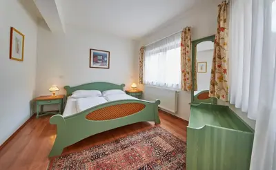 Ein Bett oder Betten in einem Zimmer der Unterkunft Chalet Haider