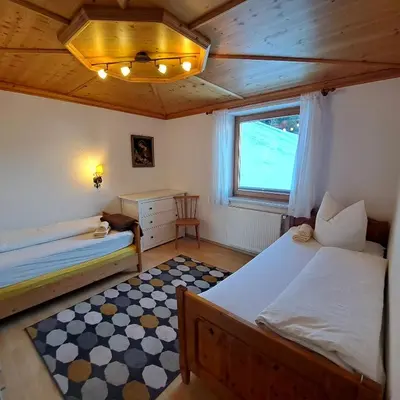 Ein Bett oder Betten in einem Zimmer der Unterkunft Schwendberg