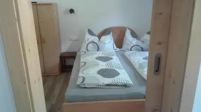 Ein Bett oder Betten in einem Zimmer der Unterkunft Schießling Hof