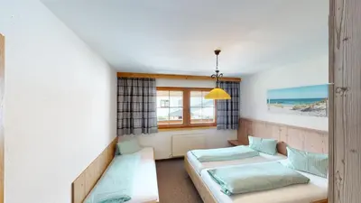 Ein Bett oder Betten in einem Zimmer der Unterkunft Apartment Daxauer