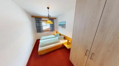 Ein Bett oder Betten in einem Zimmer der Unterkunft Apartment Daxauer